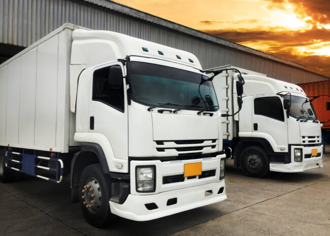white-trucks-docking-load-cargo-warehouse-freight-industry-logistics-transport